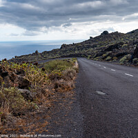 Buy canvas prints of Empty road in a volcanic landscape in the Island of La Palma by Juan Jimenez