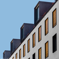 Buy canvas prints of Low angle view of modern apartment building by Juan Jimenez