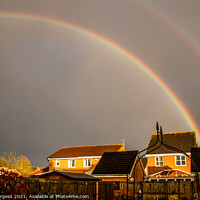 Buy canvas prints of Rainbows, over the roofs  by Holly Burgess