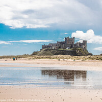 Buy canvas prints of Evocative Echoes of Bamburgh Castle, North East by Holly Burgess