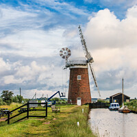 Buy canvas prints of Enigmatic Horsey Windpump: Norfolk's Resilient Ico by Holly Burgess
