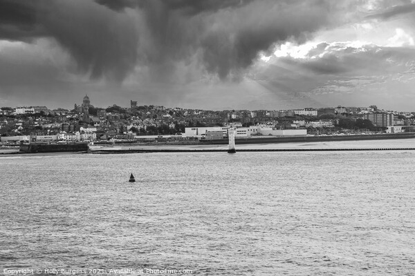 Black and white leaving Liverpool the light house on the end of the dockland Picture Board by Holly Burgess