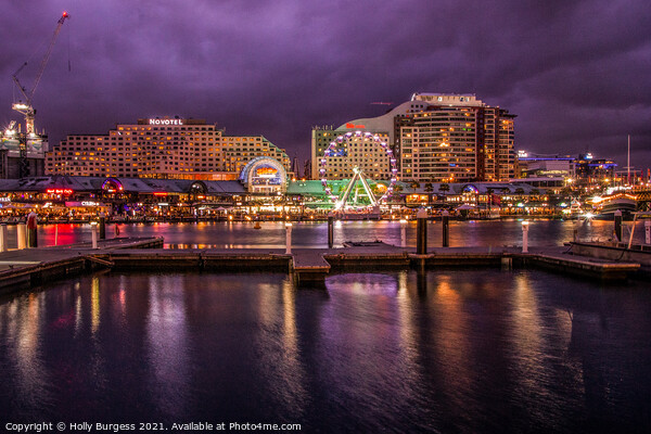 Australia,Darling Harbour at night, the lights of the amusement park in the back ground  Picture Board by Holly Burgess