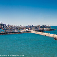 Buy canvas prints of Island of Cadiz looking at the harbour from the se by Holly Burgess