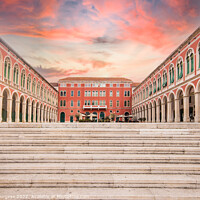 Buy canvas prints of Evocative Sunset at Split's Iconic Republic Square by Holly Burgess