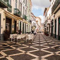 Buy canvas prints of Vibrant Ponta Delgada: A Photographic Perspective by Holly Burgess