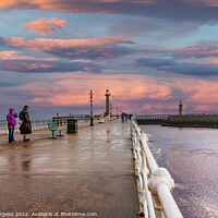 Buy canvas prints of Whitby Pier a wet day with a beautiful sunset after wards  by Holly Burgess