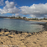 Buy canvas prints of Spanish Paradise: Costa Teguise Beach by Holly Burgess