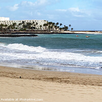 Buy canvas prints of Lanzarote beach with hotel in the back ground  by Holly Burgess