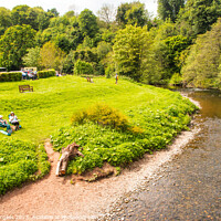Buy canvas prints of River Teviot, a nice summer day picnic by the river enjoying the sunshine at Jedburgh  by Holly Burgess