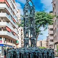 Buy canvas prints of Monumento a Los Castellers  by Holly Burgess