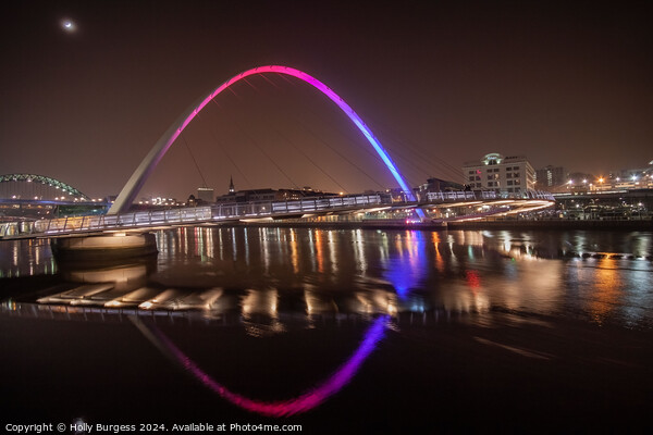 Millennium Bridge lit up at night Newcastle Quay side  Picture Board by Holly Burgess