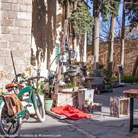 Buy canvas prints of Side shop working on old antquies in Rhodes Greece  by Holly Burgess