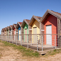 Buy canvas prints of Blyth beach Huts by Holly Burgess