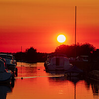 Buy canvas prints of Sunset Infusion over Thurne Dyke Norfolk  by Holly Burgess