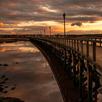 Buy canvas prints of Amble by the sea Pier at night sunset  by Holly Burgess