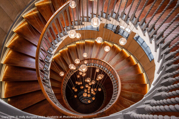 'London's Iconic Heals Staircase: A Luminary Dance Picture Board by Holly Burgess