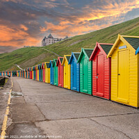 Buy canvas prints of Whitby's Colourful Beach Huts at Sunset by Holly Burgess