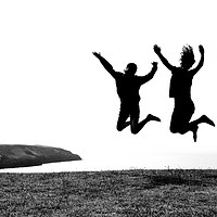 Buy canvas prints of Jumping for Joy near Abersoch by Jonathan Tallon