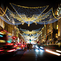 Buy canvas prints of Christmas in Regent Street. by robin whitehead
