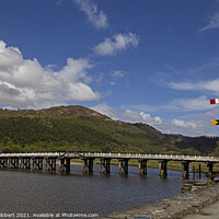 Buy canvas prints of Penmaenpool wooden toll bridge, Snowdonia National Park by Jenny Hibbert
