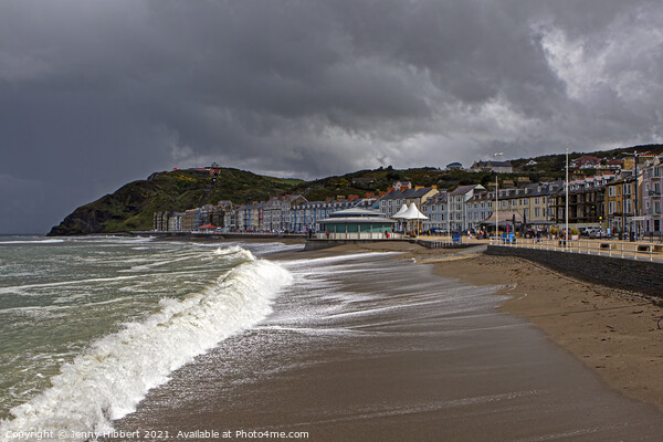 Aberystwyth on a stormy day with Constitution hill in the distance Picture Board by Jenny Hibbert