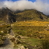 Buy canvas prints of Following the pathway up to Llyn Idwal from Cwm Idwal in North Wales by Jenny Hibbert