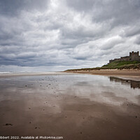 Buy canvas prints of Bamburgh Castle taken from the beach on a stormy day by Jenny Hibbert