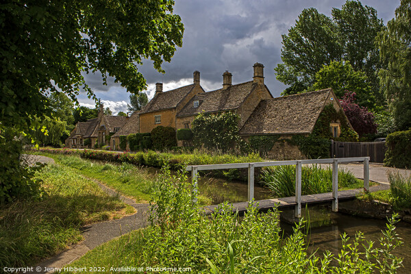 Bridge at village of Lower Slaughter Cotswolds Picture Board by Jenny Hibbert