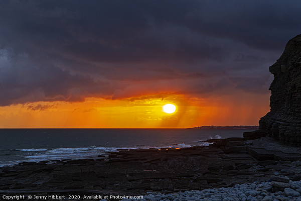 Sunsetting on a stormy evening at Dunraven Bay Gla Picture Board by Jenny Hibbert