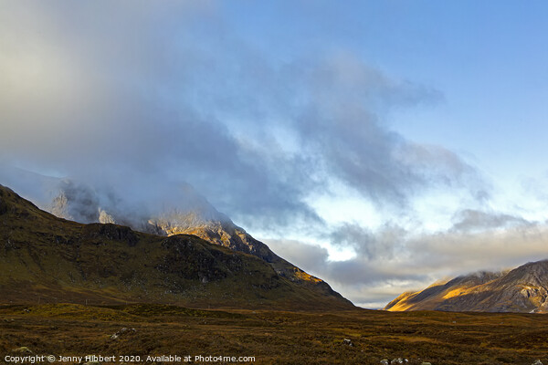 Glencoe mountain with low lying clouds and early morning light Picture Board by Jenny Hibbert