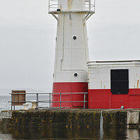 Buy canvas prints of Newlyn Lighthouse by kathy white