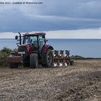 Buy canvas prints of  Case 160 Tractor  in a Cornish field by kathy white