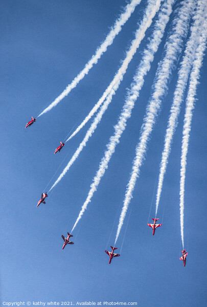 Red arrows in a cornish sky,smoke trails,  Picture Board by kathy white