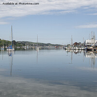 Buy canvas prints of  Penryn Harbour and Marina boat reflection by kathy white