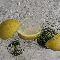 Buy canvas prints of lemon and limes splashing about by kathy white