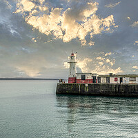 Buy canvas prints of Newlyn harbour lighthouse by kathy white