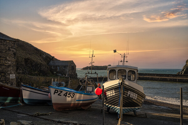  Mullion cornwall sunset,with fishing boats Picture Board by kathy white