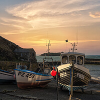 Buy canvas prints of  Mullion cornwall sunset,with fishing boats by kathy white