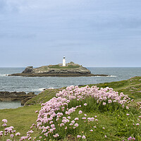 Buy canvas prints of Godrevy lighthouse with sea pinks by kathy white