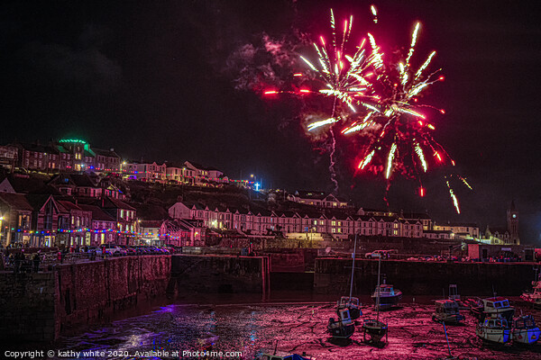 Porthleven  Cornwall red Christmas fireworks Picture Board by kathy white