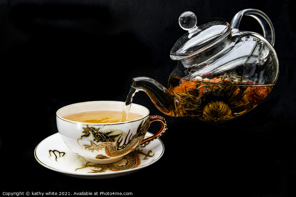 Chinese green tea being poured with glass teapot  Picture Board by kathy white