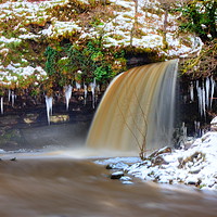 Buy canvas prints of Waterfall in snow by Clive Rees