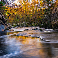 Buy canvas prints of Autumn fast flowing River by Palombella Hart