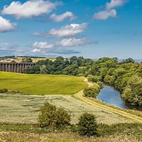 Buy canvas prints of The River Aln and Alnmouth Railway Viaduct by Richard Laidler