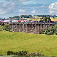 Buy canvas prints of LNER Train Crossing Alnmouth Viaduct by Richard Laidler