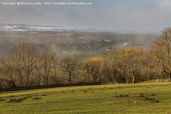 Across to Holwick in Dramatic Light and Snowstorm Picture Board by Richard Laidler