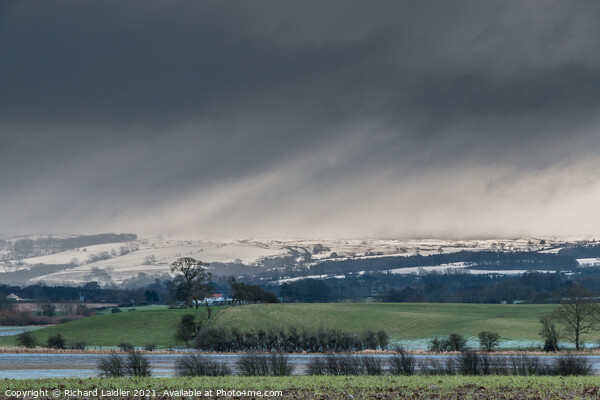 Bright Interval and Snow Squall over Newsham Moor Picture Board by Richard Laidler