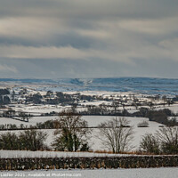 Buy canvas prints of Bright Interval on a Snowy Barningham, Teesdale by Richard Laidler