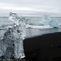 Buy canvas prints of Blocks of glacial ice washed ashore in Iceland by Lensw0rld 